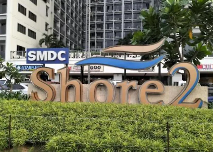 Отель Studio With Balcony, Bay View Or Pool View In Shore Residences Near Mall Of Asia And Manila Airport Манила