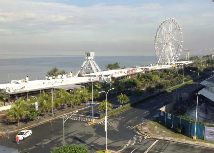 Отель Studio With Balcony, Bay View Or Pool View In Shore Residences Near Mall Of Asia And Manila Airport *
