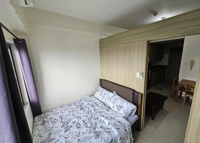 Отель Studio With Balcony, Bay View Or Pool View In Shore Residences Near Mall Of Asia And Manila Airport Манила